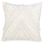 White square cushion with pompoms and patterns