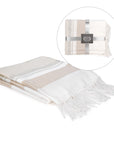 Beige and white throw with fringes