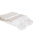 Beige and white throw with fringes