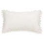 Coussin rectangulaire en velours avec pompons blancs